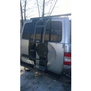ЛЕСТНИЦА К БАГАЖНИКУ УАЗ ПАТРИОТ вместо запаски усил. с алюм.поднож.